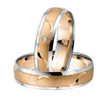Ringmaterial:
    Rotgold und W...